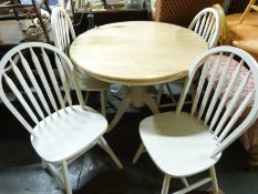 A modern table and four chairs
