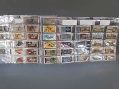 A quantity of cigarette cards to include Fauna of Rhodesia by Lambert and Butler, Wills Mining,