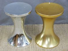 Two retro Tam Tam stools in gold and silver,