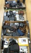 Four boxes of vintage and collectable cameras to include Canon, Olympus, Pentax, digital cameras,