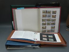 Seven albums of Isle of Man stamps