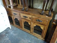 An Eastern hardwood sideboard (H88 x L191 x D51cm)