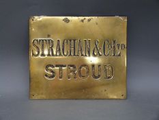 A vintage brass sign Strachan and Co Ltd,