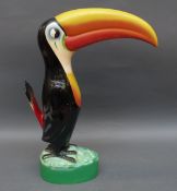 A shopfront large toucan figural money box, probably Guinness related,