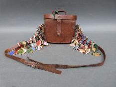 Approximately 65 enamel horse racing pendants,