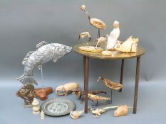 A brass trivet marked 20.