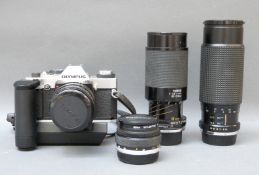 Olympus OM20 SLR camera with Tokina 28mm 1:2.8 lens, Tamron 1:3.