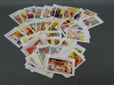A quantity of comic postcards, some scripted, includes Donald McGill, some signed Taylor,