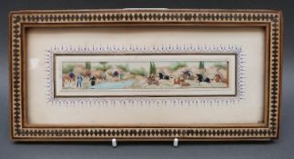 An Indian watercolour on ivory of horseman attacking a camel train,