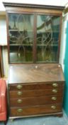 A 19thC astrigal glazed mahogany bureau bookcase