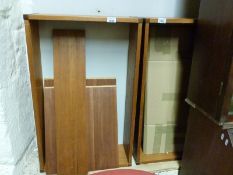 Two wall cabinets and a shelf from the retro Tapley SL teak furniture range with a levelling beam