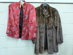 Saga mink coat and a Chinese silk jacket