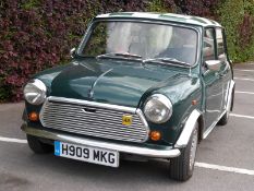 A 1990 Rover Mini Ragg Flame Checkmate, current owner 7 years, receipts for bodywork,