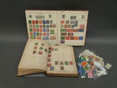 Two early stamp albums of all world stamps