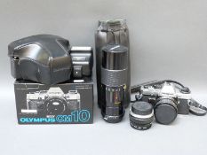 Olympus OM10 SLR camera with Tokina 24mm 1:2.8, Sunagar 1:5.6 f = 100-200mm and Olympus 1:1.