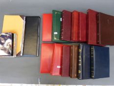 A selection of postcard albums with a wide range including humorous,