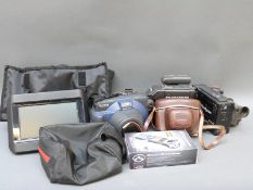 A Next Base twin screen car entertainment system, Kodak Retina 1F camera,