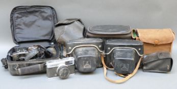 A quantity of cameras to include Praktica MTL3 with Pentacon 1.