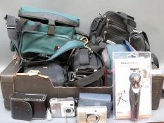 Fujifilm F810 and other digital cameras together with a quantity of camera bags and accessories
