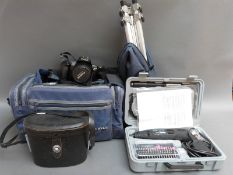 Canon EOS 1000F camera, accessories, multi tool,