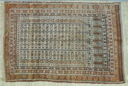 An Afghan rug on brown ground (150 x 98cm)