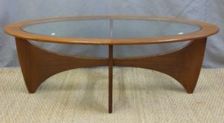 A retro G-Plan glazed coffee table raised on shaped legs (H42 x L115 x W62cm)