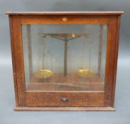Two cased sets of jeweller's scales with weights by Philip Harris and Co.