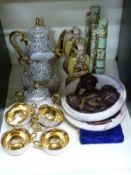 Two relief plaques, a decorative coffee set, two figural vases,
