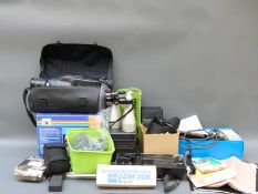 A quantity of camera equipment to include Canon video camera, Frank Nipole 12x50 binoculars,