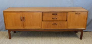 A G-Plan retro sideboard with cupboards and part inset drawers (H69x x W206 x D46cm)