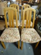 Four pine chairs