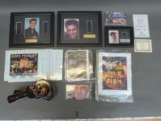 A collection of Elvis Presley watches, ceramics, stamps,