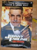 A cinema advertising poster for Universal Studio 'Johnny English Reborn' starring Rowan Atkinson