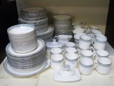 Royal Doulton twelve place setting dinner and tea service with extras in the Etude pattern