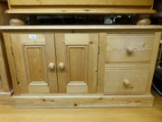 A pair of pine cupboard and drawer units,