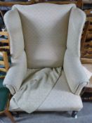 A Georgian wing back armchair,