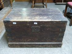 A metal bound seaman's trunk with rope handles by Miller, Rayner and Heysom Outfitters, London,