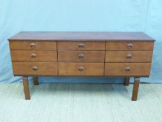 A retro Schreiber sideboard fitted with nine drawers (H72 x W148 x D43cm)