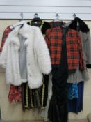 A collection of ladies clothes including dresses, jackets and evening wear in sizes 8, 10, M.