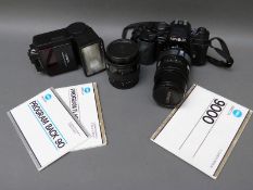 Minolta 9000 SLR camera with 35-105mm lens and a 24-50mm lens and flash