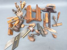 A quantity of vintage woodworking tools including mortice gauge, further marking out tools, planes,