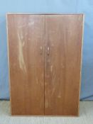 A retro two door Staples Ladderax wardrobe with fitted interior,