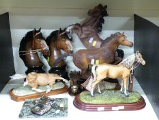 A quantity of horse figures