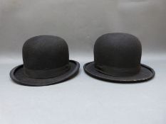 Two bowler hats, one The Falcon the other Tress & Co.