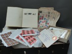 A box of GB first day covers and presentation packs