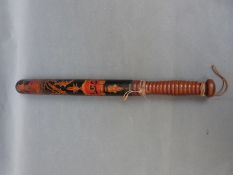 A Victorian truncheon, hand painted on black lacquer with the 'VR' cypher and L C C below,