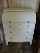 A tambour fronted painted bureau with fitted interior,