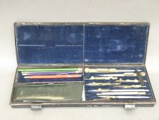 Aston & Mander Ltd cased ivory and brass drawing set with two boxes of Faber No 5 leads and two