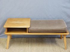 A retro Ercol style light elm telephone seat with removable cushion raised on splayed legs (H46 x