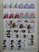 Three stockbooks of modern GB stamps, gutter pairs,